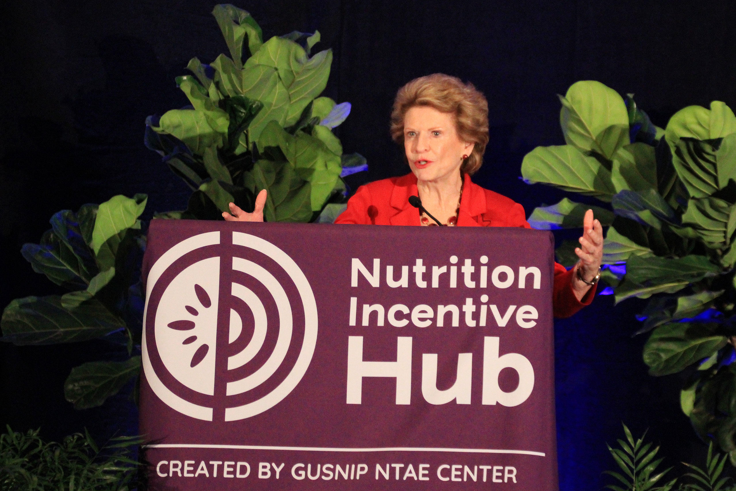 Senate Agriculture Committee Chairwoman Debbie Stabenow speaking at the Nutrition Incentive Hub National Convening in Arlington, Virginia in June 2023.